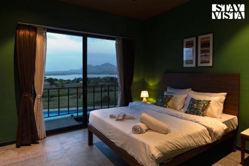 StayVista's Minty Mirage - Mountain & Lake-View Villa with Pool, Expansive Lawn & Terrace in Girnare