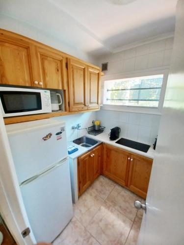 廚房, Apt con piscina en Calella de Palafrugell, parking gratuito in 帕拉弗魯赫爾