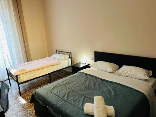 Camera tripla, bagno in comune