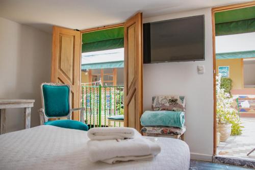 共用ラウンジ/TVエリア, Hotel La Casona de Getsemani in カルタヘナ