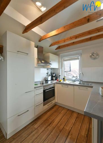 廚房, Uns to Hus - Ferienwohnung Suennupgang in 尤斯特