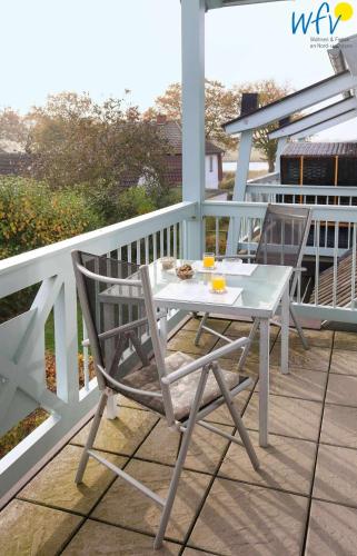 ระเบียง/ชานเรือน, Ferienpark Seedorf Fischerhaus - Ferienwohnung 12 in อัลเทนซีน