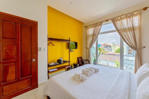 Green Town House Hoi An, Hoi An (foto 9)