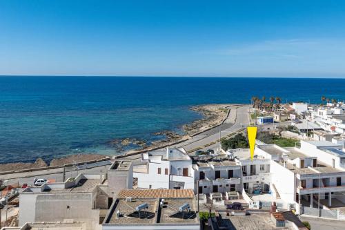 Camere arcobaleno fronte mare a Torre san Giovanni