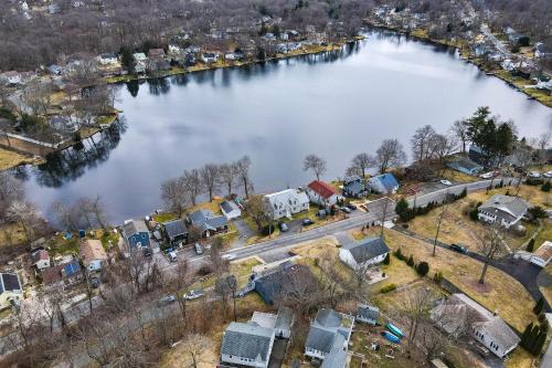 Modern Terryville Cottage with Deck and Lake View!