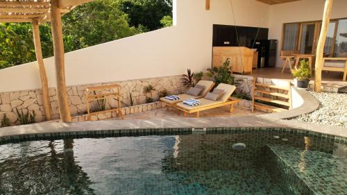 Peldbaseins, Akasha Beach Club in Tanete