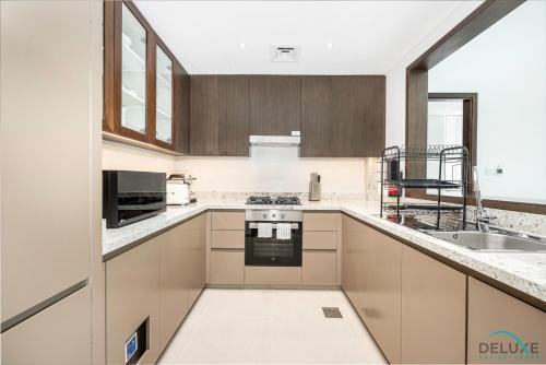 Exclusive Deal Best Price for Stylish 1BR Stay by Deluxe Holiday Homes, Dubaj (zdjęcie 10)