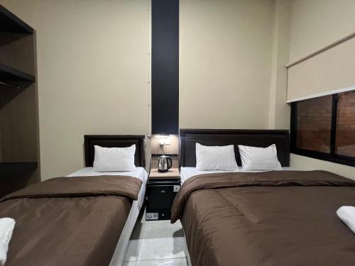 Family Room room in Brenn Hotel Semarang Mitra RedDoorz