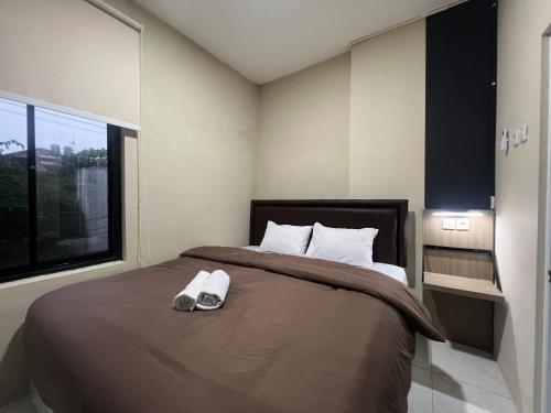 Deluxe Double Room room in Brenn Hotel Semarang Mitra RedDoorz