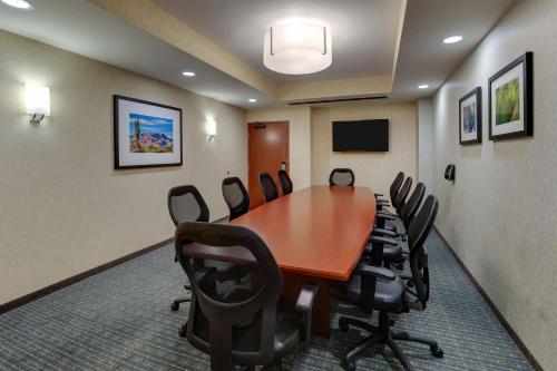 King Meeting Suite with Board Room Table, 2 Rooms - Hearing Accessible , Roll-in Shower