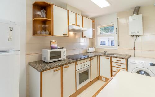 Apartamento Laura Mar con piscina en La Fosca in Sant Joan de Palamos