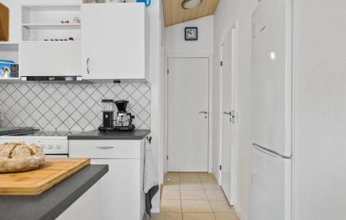 Kitchen, Holiday Home Strandbyskoven Nexø Iii in Snogebaek