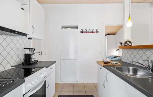 Kitchen, Holiday Home Strandbyskoven Nexø Iii in Snogebaek