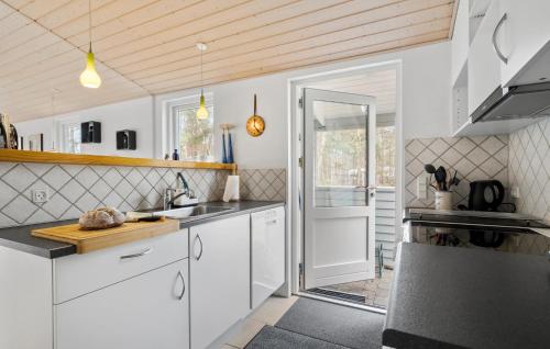 Kitchen, Holiday Home Strandbyskoven Nexø Iii in Snogebaek