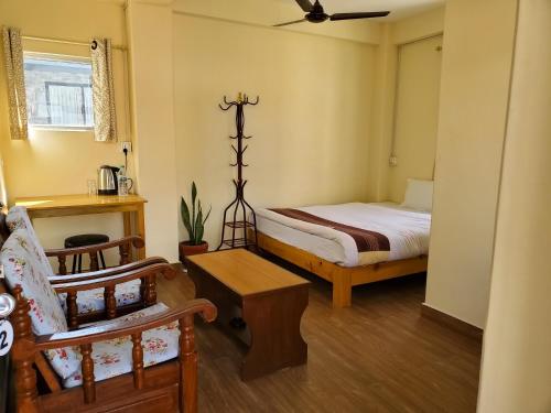 Double Room with Private Bathroom room in Santoshi Guest House and Yoga Center