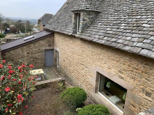 Maison bretonne en pierre avec WIFI et piscine couverte à LOUANNEC - Réf 846