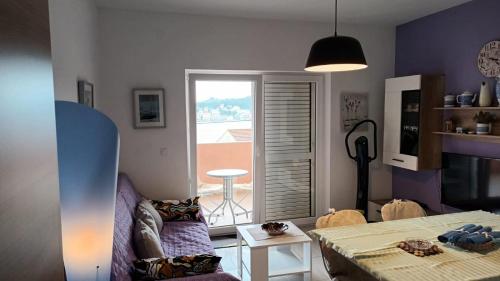 One-Bedroom Apartment with Balcony and Sea View