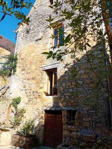 Maison de la Ruelle, vue sur les toits de Domme - Location saisonnière - Domme