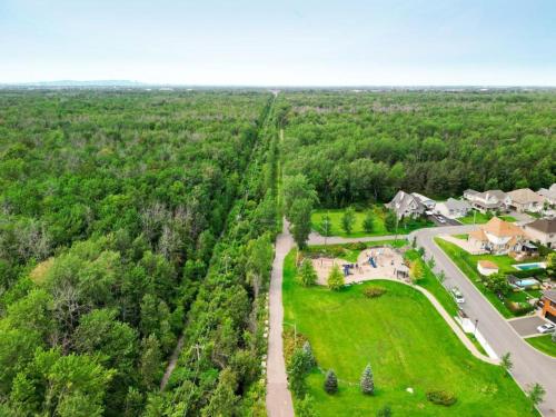 Γύρω περιβάλλον, L'Oasis Urbaine in Longueuil (QC)