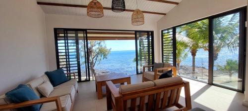 Canari Waterfront Villas - Tap to explore photos
