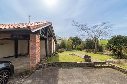 Preciosa casa con jardín