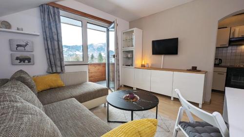 Ferienwohnung Edeltraud, fußläufig zum See und 20 Minuten vom Skigebiet entfernt, Ferienwohnung in Döbriach