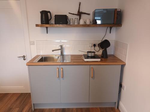 virtuve, Connemara Lake View Apartment in Camus