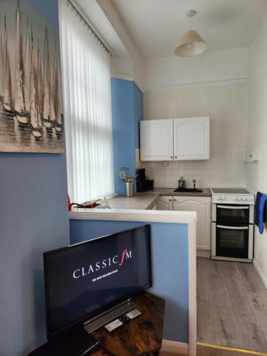 ห้องครัว, Rose Court Holiday Apartments in บับบาคอมบ์