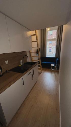 Cozinha, Łokietkowo Apartamenty Szczecin Centrum (Lokietkowo Apartamenty Szczecin Centrum) in Szczecin