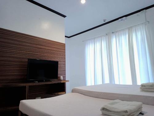 VILLA LOURDES RESORT Room Type - Deluxe Quadruple Room