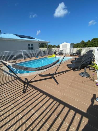 Les Terrasses de Vinty 3 villas autour d'une piscine