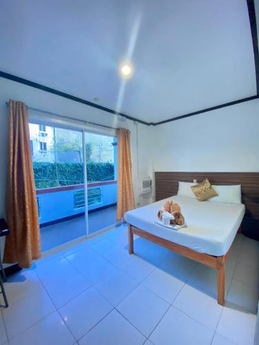 VILLA LOURDES RESORT Room Type - Deluxe Double Room (2 Adults + 1 Child) VILLA LOURDES RESORT Room Type - Deluxe Double Room (2 Adults + 1 Child)