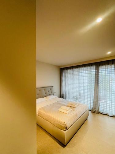 Appartamento con giardino a due passi da TASIS in Collina d'Oro