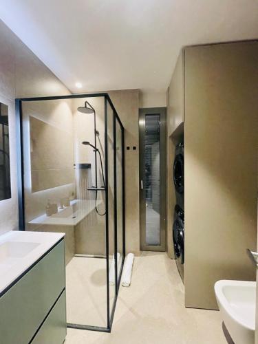 Appartamento con giardino a due passi da TASIS in Collina d'Oro