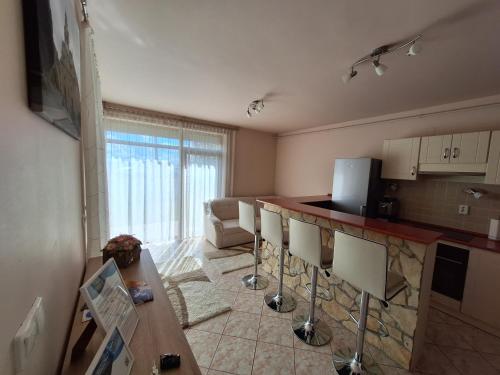 Makra-tető Öregtölgy Apartman