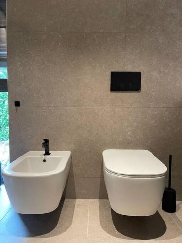 Elegante e moderno apartamento a due passi da TASIS in Collina d'Oro