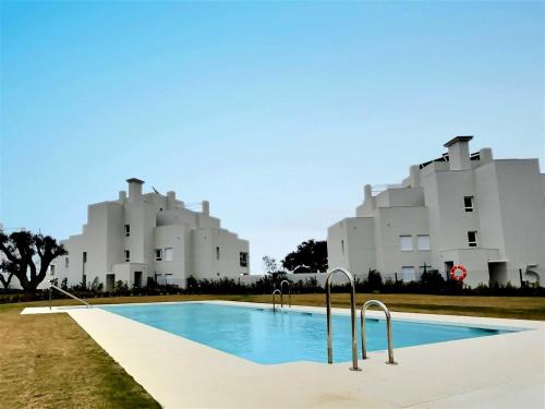 Chic Mediterranean Living In This Three-Bedroom Penthouse Situated in the San Roque Club Resort