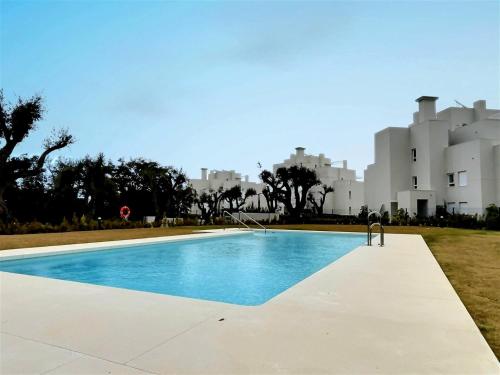 Chic Mediterranean Living In This Three-Bedroom Penthouse Situated in the San Roque Club Resort