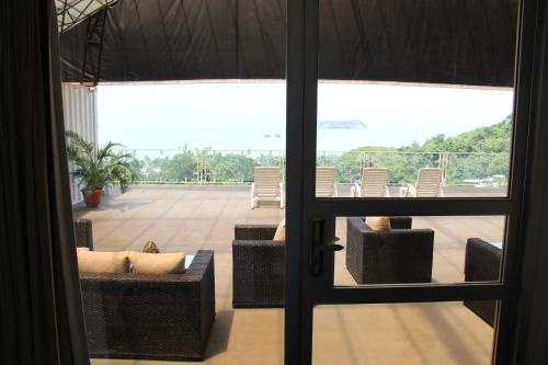 Uitzicht, El Faro Containers Beach Hotel in Quepos