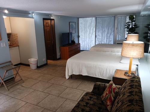 Standard Queen Room with Two Queen Beds image 2