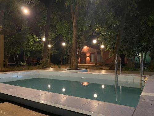 The Mango Woods Rustic Cottage with Bathtub in Alibag Farm Stay with Swimming Pool