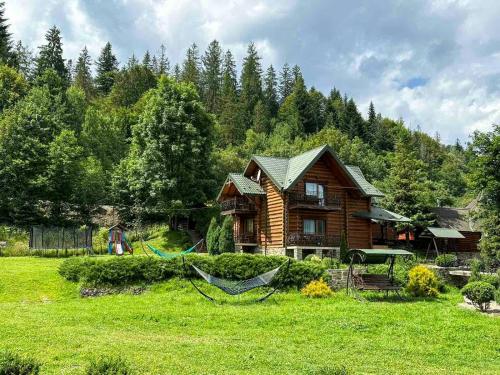 Комплекс котеджів Під лісом - Accommodation - Mykulychyn