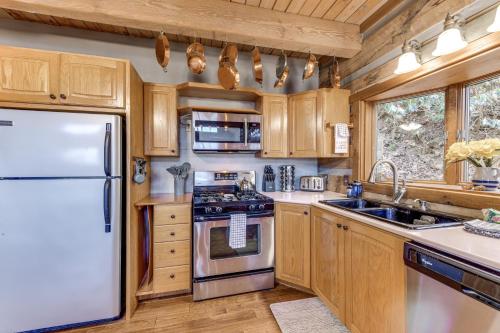 Spacious Maggie Valley Cabin with Waterfall On-Site!