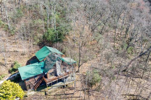 Spacious Maggie Valley Cabin with Waterfall On-Site!