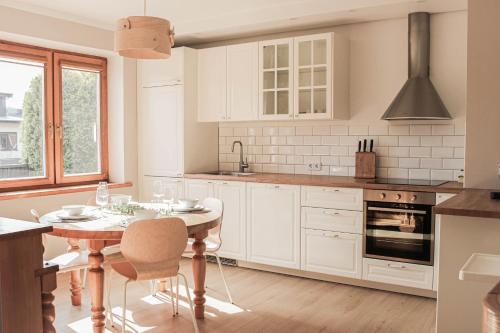 Upės apartamentai II su kiemeliu ir baseinu Upės apartamentai II su kiemeliu ir baseinu