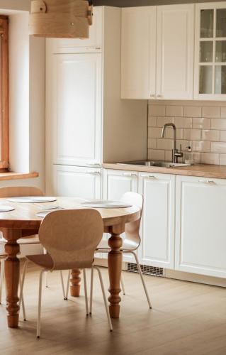 Upės apartamentai II su kiemeliu ir baseinu Upės apartamentai II su kiemeliu ir baseinu