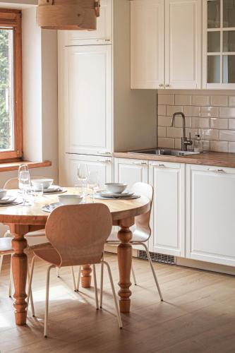 Upės apartamentai II su kiemeliu ir baseinu Upės apartamentai II su kiemeliu ir baseinu