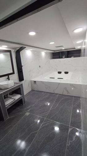 Casa con ambiente familiar- Jacuzzi privado