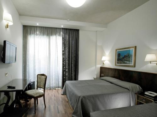Quadruple Room with Balcony