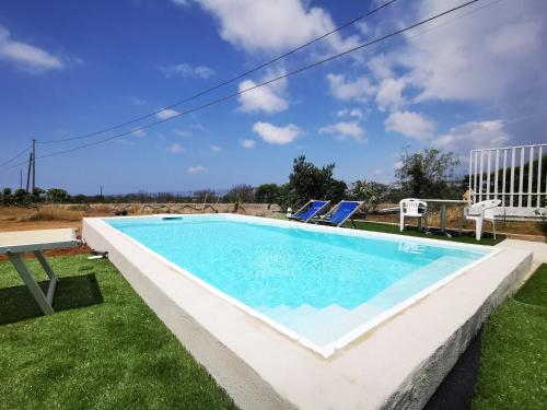 Bilocale a Torre San Giovanni con piscina